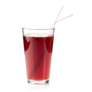 Glas mit trinkForm® Rote-Traube-Himbeerkonzentrat und zwei rosa Strohhalmen, ein vollmundiges Trinkerlebnis